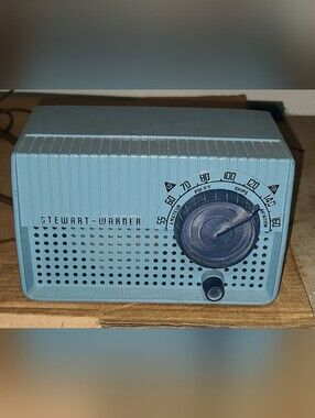 vintage Stewart-Warner Tube radio model 9181 with blue outer shell.
